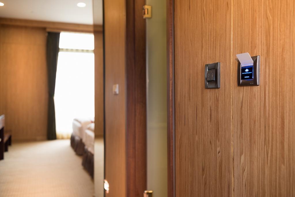 Shandori Hotel Джиаоси Екстериор снимка
