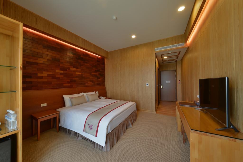 Shandori Hotel Джиаоси Екстериор снимка