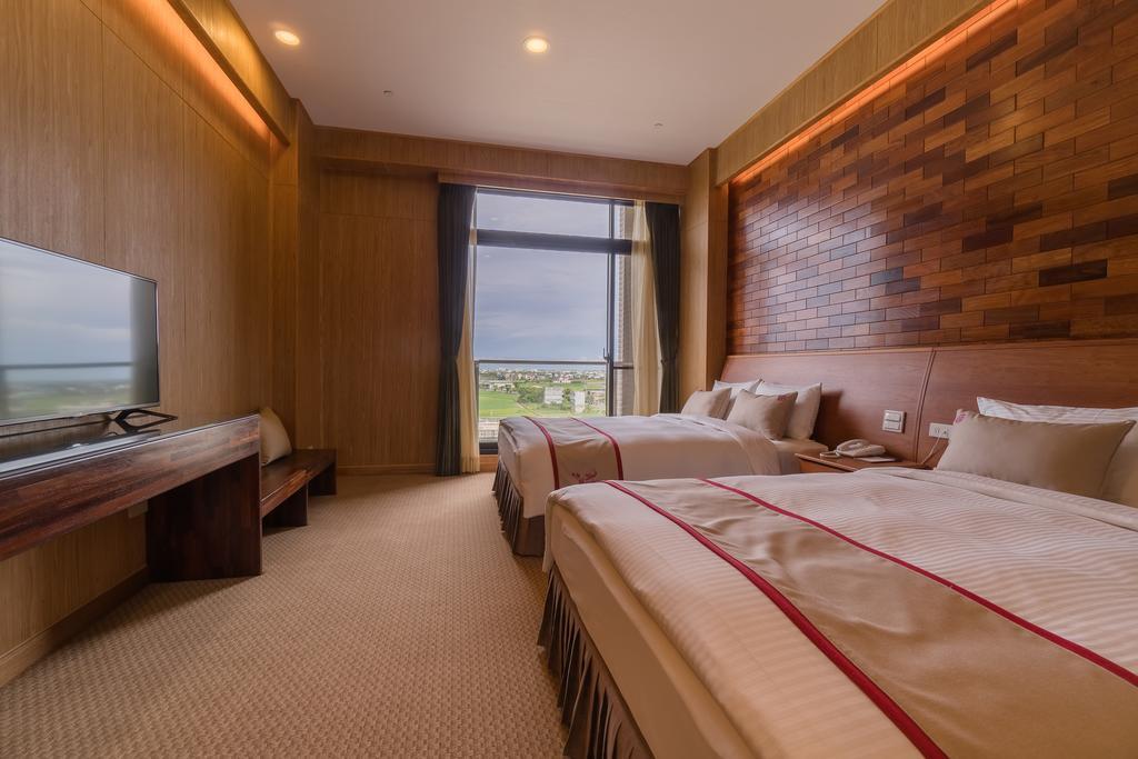 Shandori Hotel Джиаоси Екстериор снимка