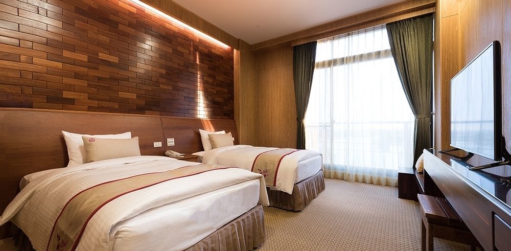 Shandori Hotel Джиаоси Екстериор снимка