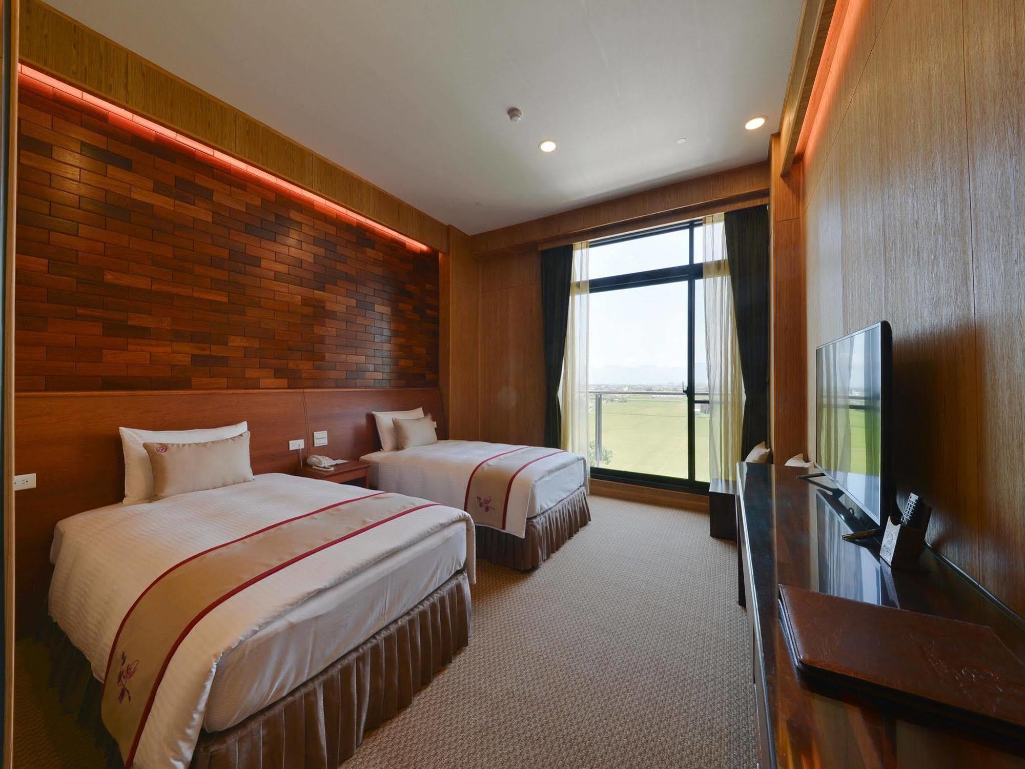 Shandori Hotel Джиаоси Екстериор снимка