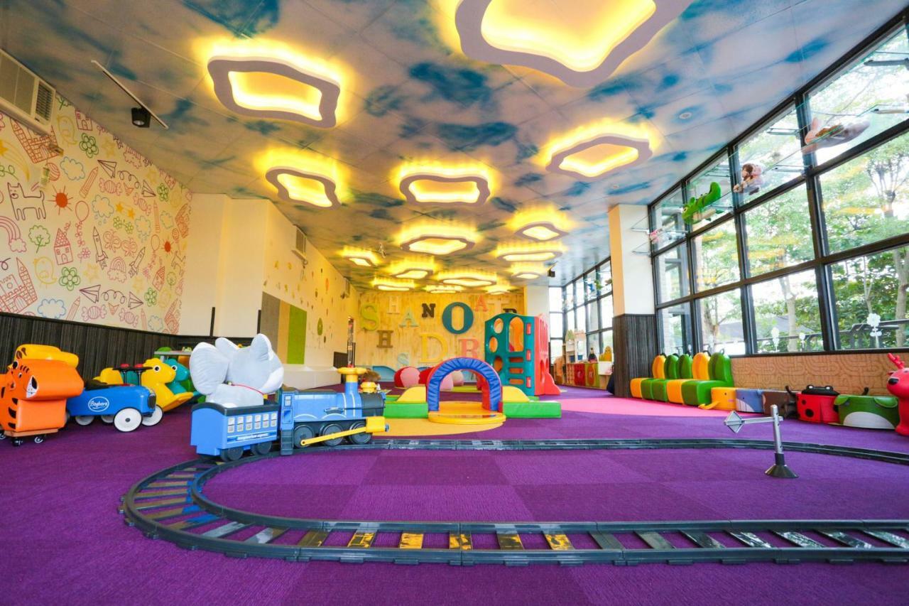 Shandori Hotel Джиаоси Екстериор снимка