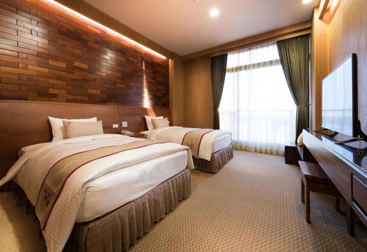 Shandori Hotel Джиаоси Екстериор снимка